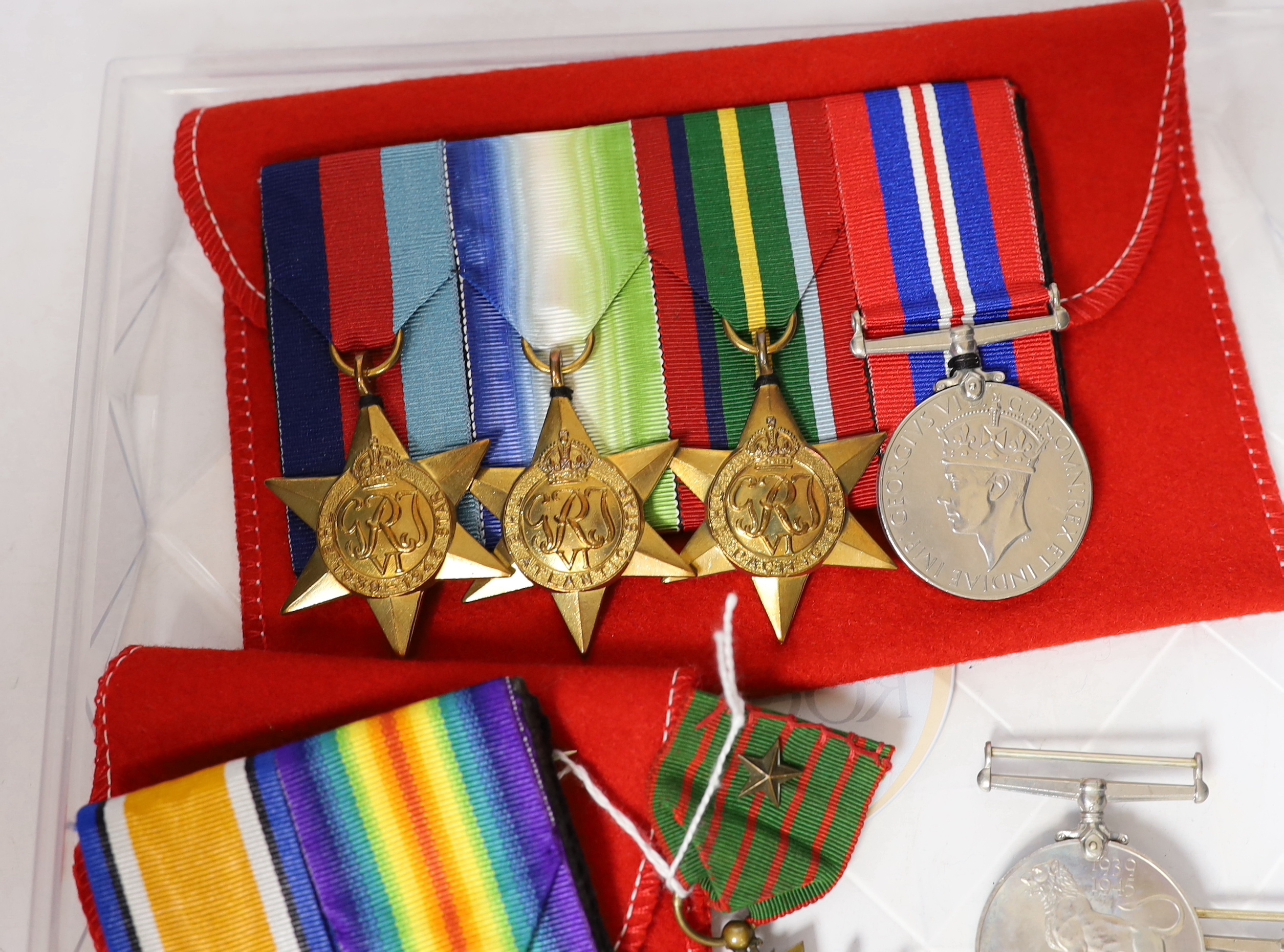 Nine WWI / WWII medals; a pair of WWI medals, the War medal and Victory medal to J.R. Hemmings R.A.F., a pair of WWII medals in O.H.M.S. card box to J.B. Robinson, with oak leaf, a group comprising; the 1939-45 Star, the